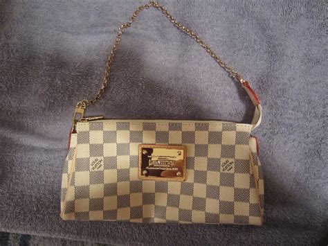 louis vuitton eva clutch fake vs real|eva clutch for sale.